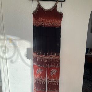Free people sheer boho romper. Perfect trendy look for the beach or poolside. XS